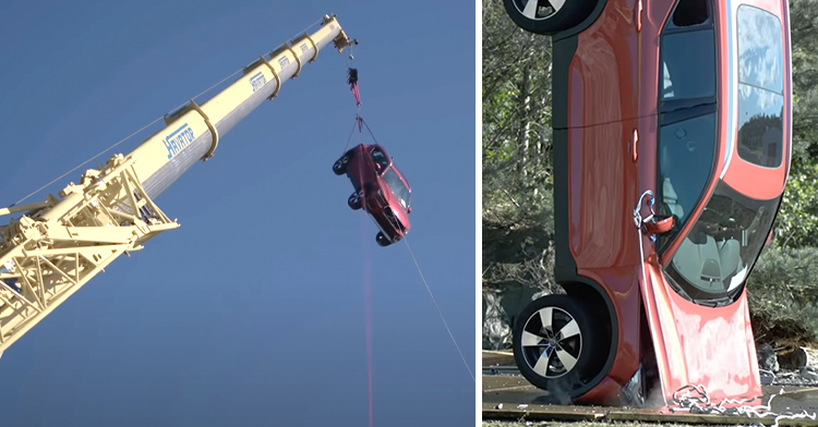 Car hanging from crane