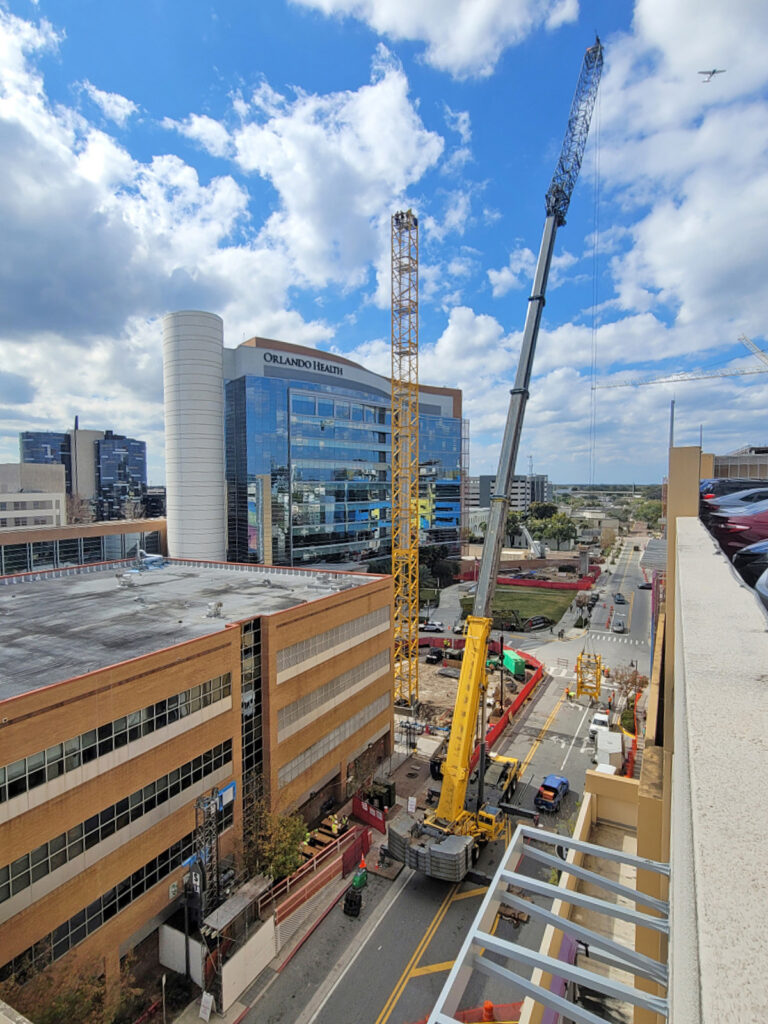 Cranes working in downtown area
